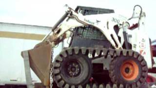 BOBCAT 773 SKID STEER LOADER WITH TRACKS [upl. by Attolrac52]