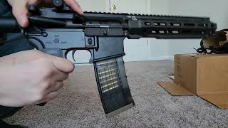 Airsoft Modified Rare Arms AR15 With Translucent Mag and Real 556 Casings [upl. by Netsrejk912]