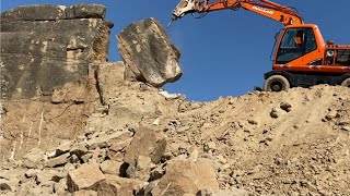 Wow AmazingDoosan 130 Excavator Breaking Dangerous Rock At The Top Of Mountain [upl. by Moclam]