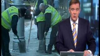 Man slips on ice in Dublin on RTE news [upl. by Geehan672]