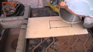 Cutting an Outlet Hole Into a Tile [upl. by Botnick]