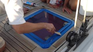 How To Reseal A Topside Hatch Window On A Boat [upl. by Candide264]