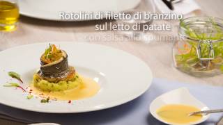 Rotolini di filetto di branzino su un letto di patate con salsa allo spumante [upl. by Bridge]