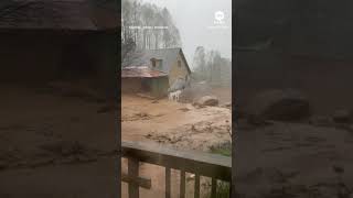 Mudslide triggered by Helene sweeps through North Carolina yard [upl. by Elleyoj795]