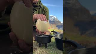 Separating egg yolks from whites🍳👨‍🍳 OutdoorCooking NatureChef 🔥 [upl. by Ellennod359]