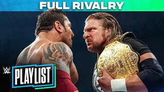 Batista vs Triple H – RIVALRY HISTORY WWE Playlist [upl. by Enelak67]