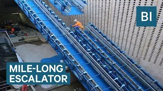 This Mile Long Escalator Leads To A London Train That Stretches 60 Miles [upl. by Sitruc]