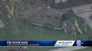 FBI raids home in Milwaukee with armored vehicle and flash bangs [upl. by Anecuza198]