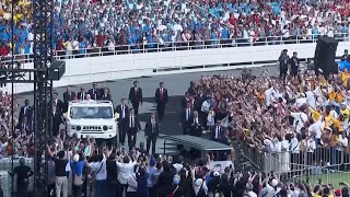 Tens of thousands of faithful fill Jakarta stadium for Papal Mass  VOANews [upl. by Ahsiket]