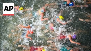 Triathlon kicks off on Day 5 at Paris Olympics  AP Top Photos [upl. by Greenberg]