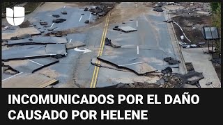 Carreteras troceadas levantadas e inundadas los efectos de Helene sobre el pavimento [upl. by Araf797]