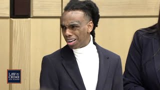 YNW Melly Appears Aggravated When Mouthing Words to Trial Observer After Court [upl. by Ketchan752]