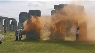 Just Stop Oil Activists spray Stonehenge orange demanding stop of Fossil Fuels [upl. by Livvyy]