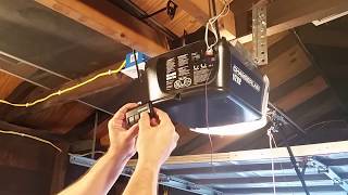 How to Program a Chamberlain Garage Door Remote Control Opener [upl. by Ormond291]