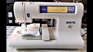 White Embroidery Machine demonstrating an embroidery design [upl. by Phippen]