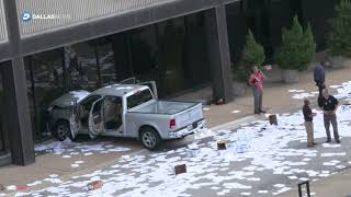 Pickup driver ranting about treason crashes into Fox 4 building in Dallas [upl. by Harikahs]