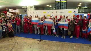 Russians give Olympic athletes a heroes welcome home [upl. by Till888]