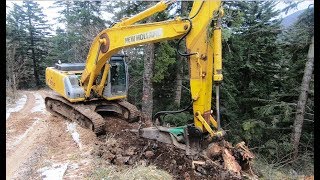 Hammering Stump and Rock with an New Holland excavator [upl. by Noelyn]