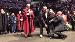 Florida State University student Payton Poulin walks at graduation [upl. by Miarzim]