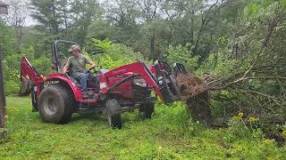 Moving Overgrown Bush with Backhoe on my Mahindra 1526 Tractor [upl. by Tillfourd853]