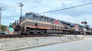 Monongahela Railway Heritage unit of Norfolk Southern leading NS28C intermodal on track two [upl. by Lleinad]