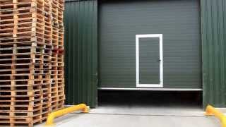 Sectional Door with Pass Door [upl. by Yemirej]