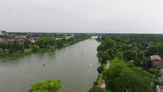 Rowing team is gliding through the water practicing on the Aasee Lake surrounded by the lush green [upl. by Corly]