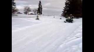 1991 Arctic Cat Wildcat 700cc Snowmobile jump in slow mo [upl. by Tuppeny]