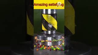 Crushing candy with 100 ton Hydraulic Presshydraulicpresscrushingsatisfyingviralcandy [upl. by Ainar]