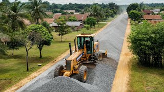 Wow Rural road construction a KOMATSU motor grader pushes gravel to make a foundation new street [upl. by Ifen]