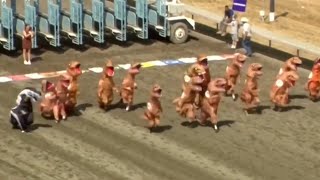 Hundreds race in inflatable Trex costumes in Seattle [upl. by Aronaele]