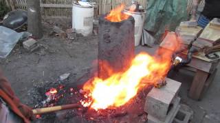 Traditional smelt using manpowered bellows [upl. by Rora]