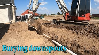 Burying Downspouts On New Construction Home [upl. by Hanikas524]