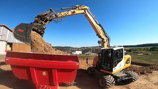 Erdarbeiten mit dem Liebherr A914 Compact Radbagger [upl. by Hoi342]