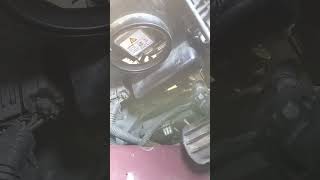 Installing a 2009 Lincoln MKS headlight bulb without removing the bumper [upl. by Annmarie]