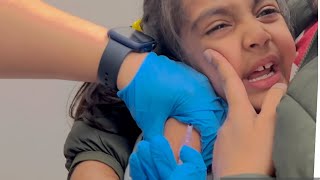 6 years old crying girl getting her shots vaccination shots for school [upl. by Annim501]