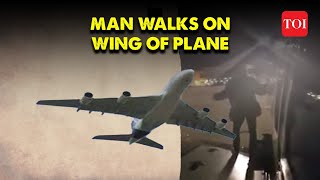 Video Mexico Man Opens Emergency Exit Strolls on Parked Planes Wings  Top News [upl. by Amalia541]