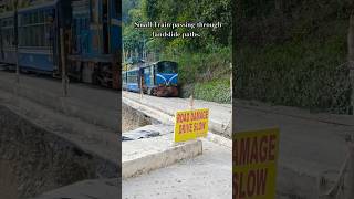 A small train carefully passes through the path of a landslide Toytrain Darjeeling DHR nfrailway [upl. by Hernando]