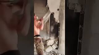 Wall demolition process with sledgehammer [upl. by Eyeleen]