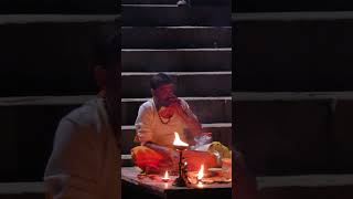 A priest on the banks of Ganga River at Meer Ghat Varanasi [upl. by Monteith]