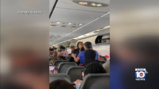 Cellphone video shows disturbance on Frontier flight that led to arrest [upl. by Laira426]