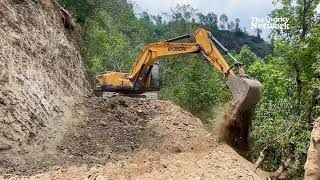 Accomplished Excavator Operator Builds Road on Steep Mountain [upl. by Hannavahs]