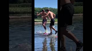 Spring logrolling on a lake lumberjack athlete usalumberjack spring logrolling athlete [upl. by Slavin]