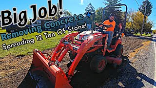 Digging out concrete Spreading 12 ton of stone  Grading Dirt [upl. by Oliva]