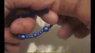 How to make a stretch bracelet [upl. by Loralie705]