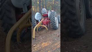 Using a tractor auger implement as a log archboom [upl. by Ott352]