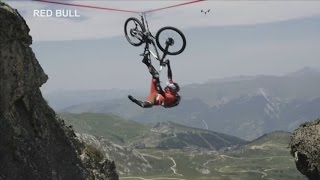 Cyclist falls off tightrope over 120 metre drop in French Alps [upl. by Candra96]