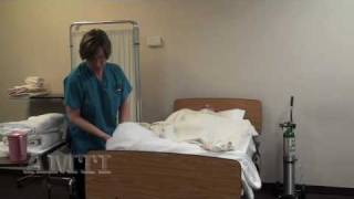 CNA Skills Making an Occupied Bed Making Part 1 [upl. by Fedirko]