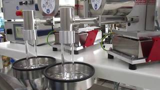 Brabender 20 40 twin screw ribbon die with Univex take off [upl. by Yemiaj]