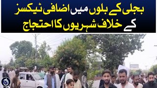 People protest against additional taxes in electricity bills  Aaj News [upl. by Dixil]